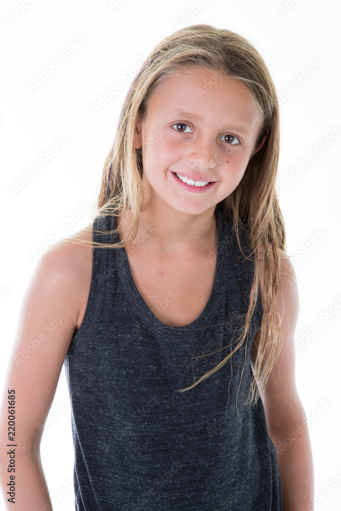 Smiling little girl dressed in black on isolated white background Smiling little girl dressed in black on isolated white background