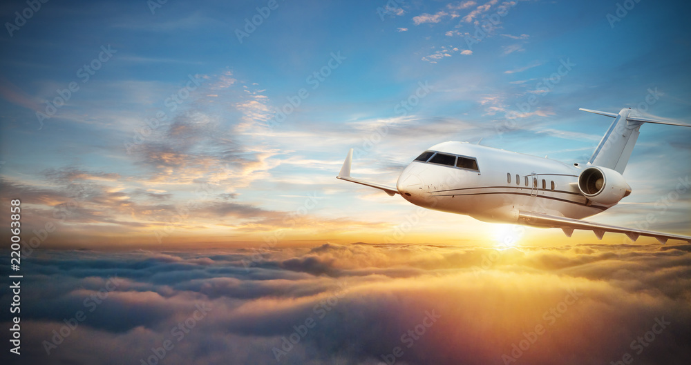 Fototapeta premium Luksusowy prywatny odrzutowiec latający nad chmurami