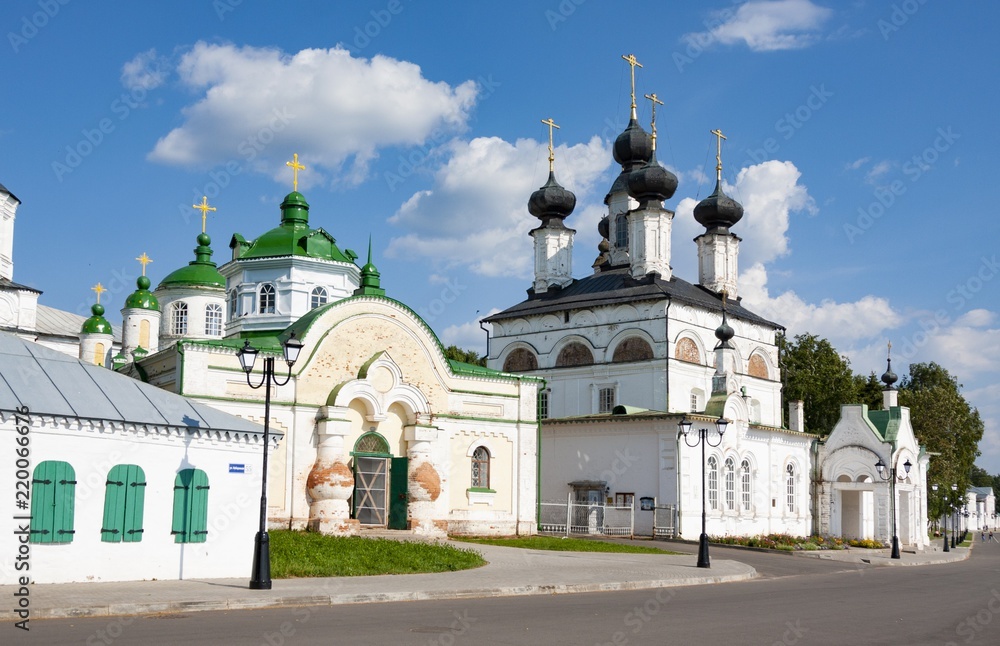 Fototapeta premium Cathedral St. Procopia Ustyuzhsky and Cathedral of St. John of Ustyug en embankment of river Suhona, Veliky Ustyug, Vologda region