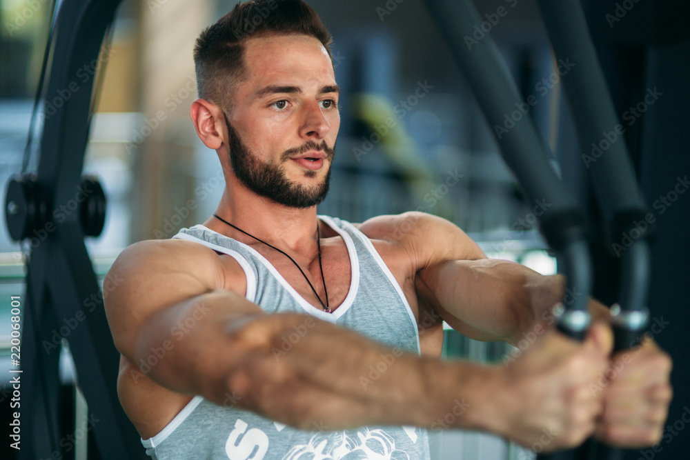 Athlete with beard tranins in the gym Athlete with beard tranins in the gym