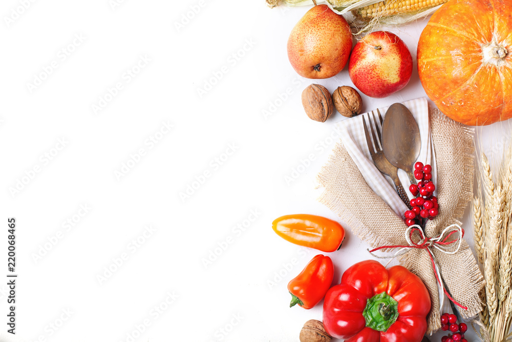 Happy Thanksgiving Day background, table decorated with Pumpkins, Maize, fruits and autumn leaves. Harvest festival. The view from the top. Horizontal. Background with copy space.