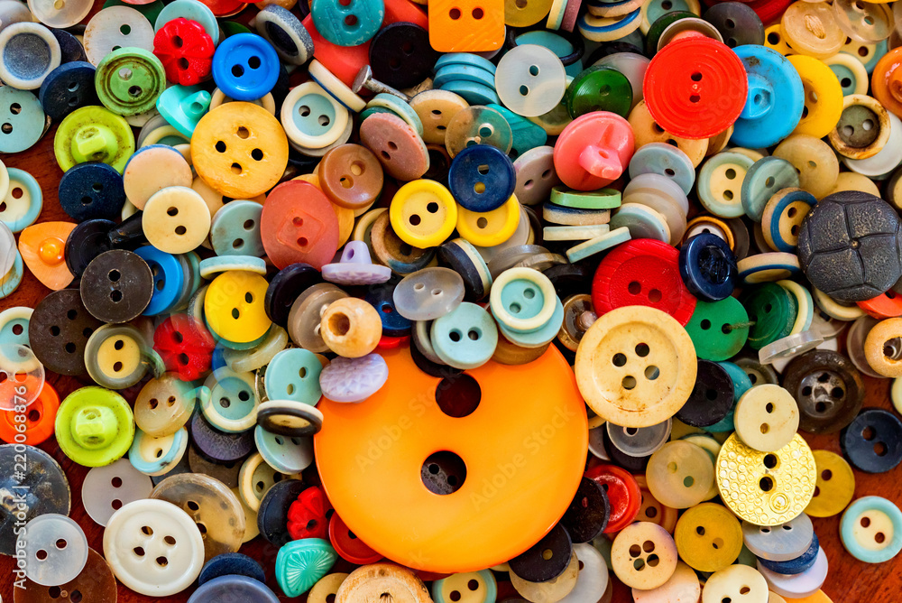Close up of sewing colorful buttons background Close up of sewing colorful buttons background