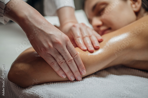 Fotografija Woman Enjoying Arms and Shoulders Massage.