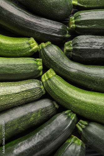 Ripe zucchinis as background