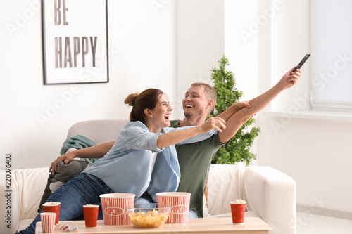 Couple fighting for remote ...