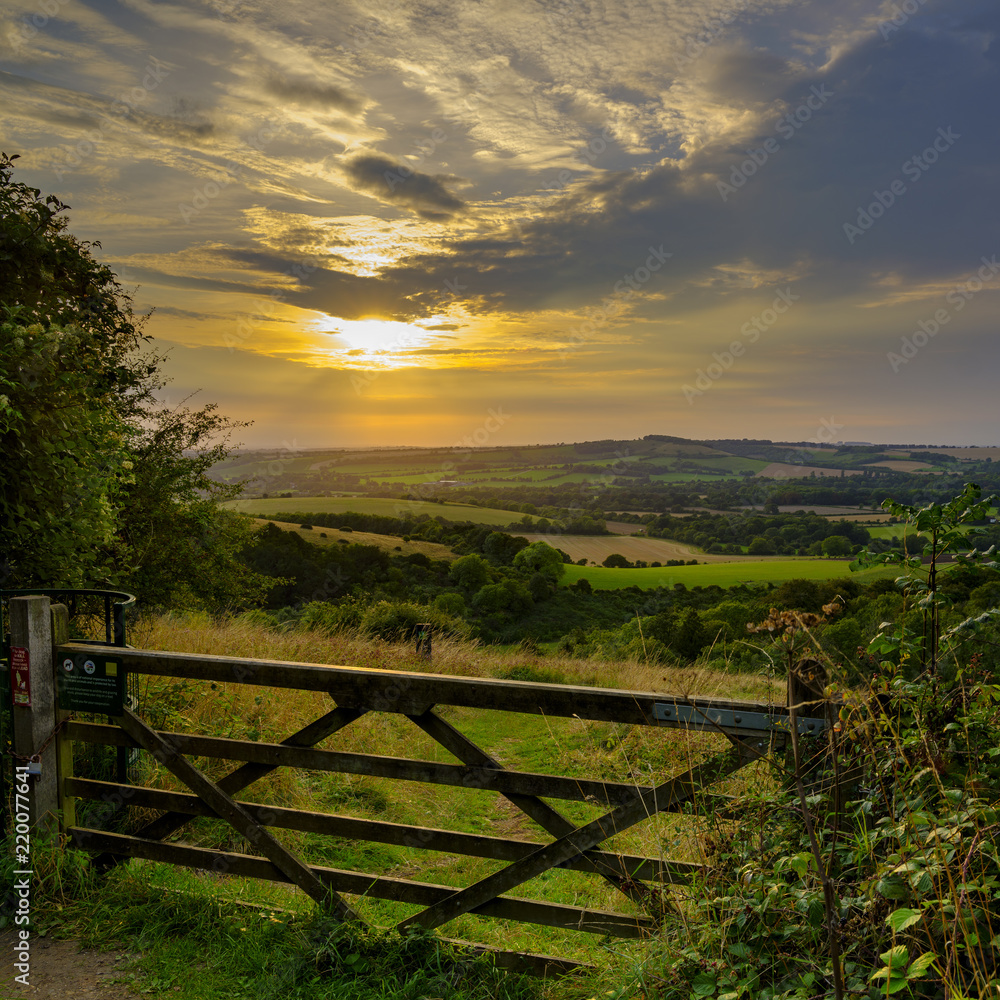 Summer sunset over Beacon Hill from the weather station on Old Winchester Hill, in the South Downs National Park, Hampshire, UK