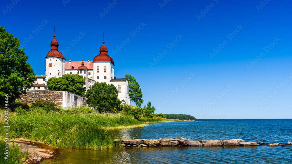 View over lake Vanern with Lacko castle on the lakeside.