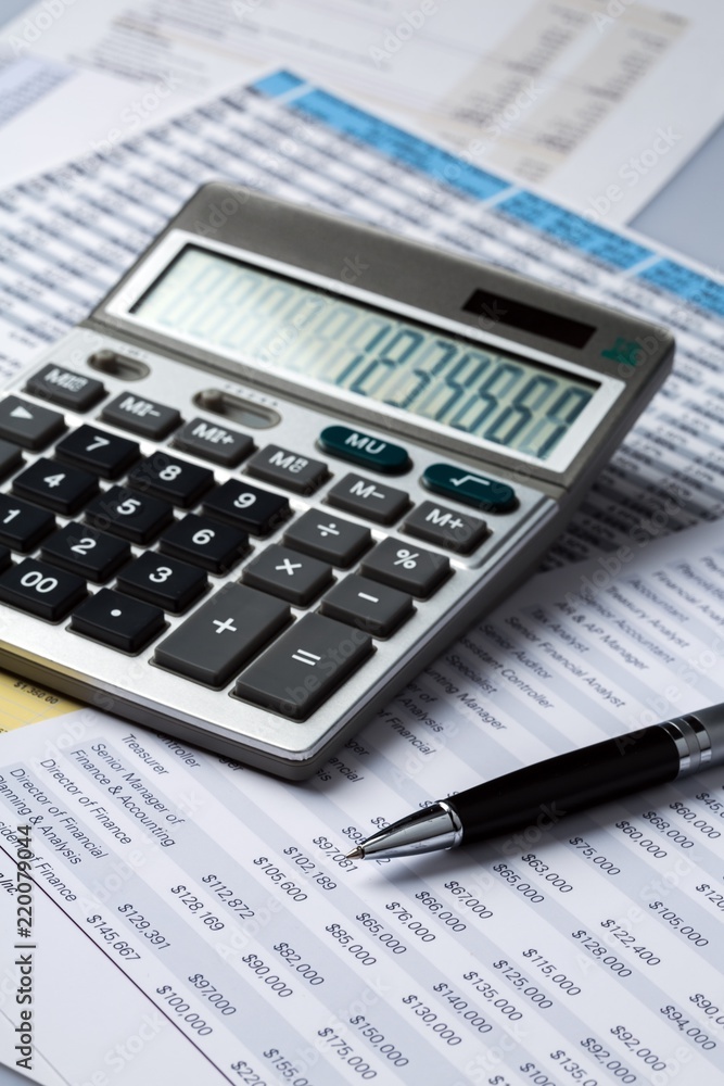 Financial document and calculator Financial document and calculator