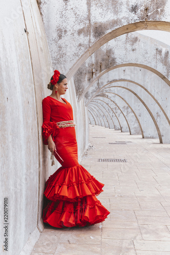 Woman dressed in red dancing flamenco in Malaga