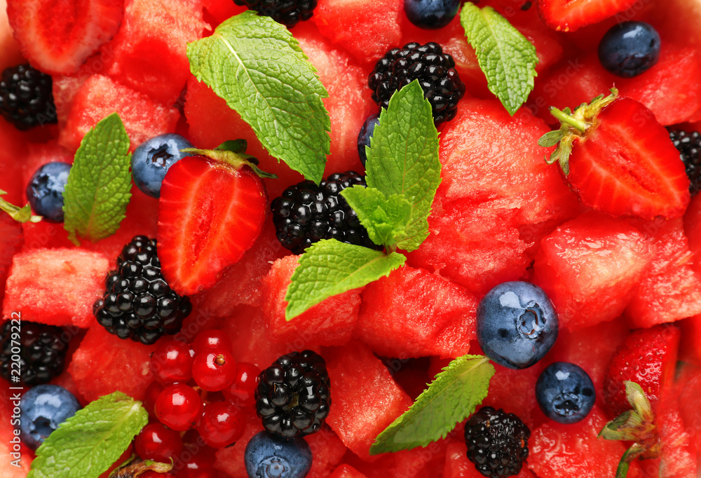 Salad with delicious watermelon and berries as background Salad with delicious watermelon and berries as background