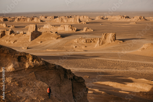 Sunrise in the Lut Desert (also Kalut desert), one of the driest and hottest places in the world. photo