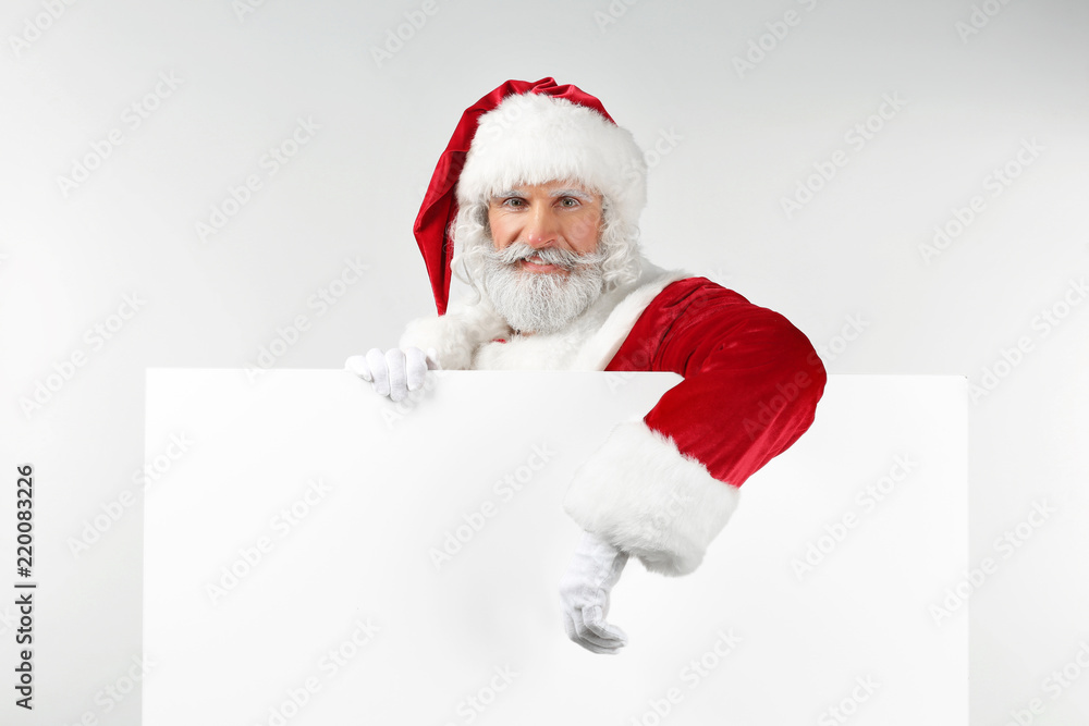 Portrait of Santa Claus with blank poster on white background Portrait of Santa Claus with blank poster on white background