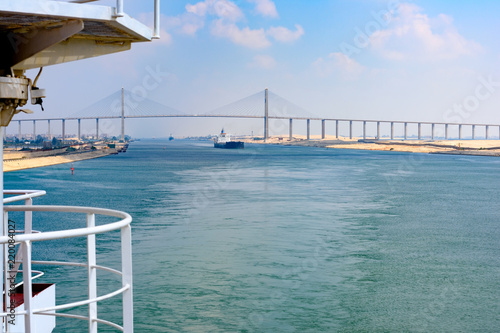 Cargo ship passing through Suez Canal, Egypt photo