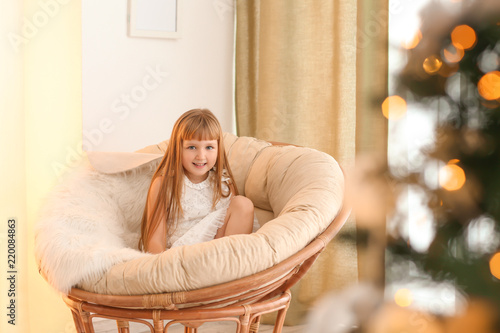 Cute little girl relaxing i...