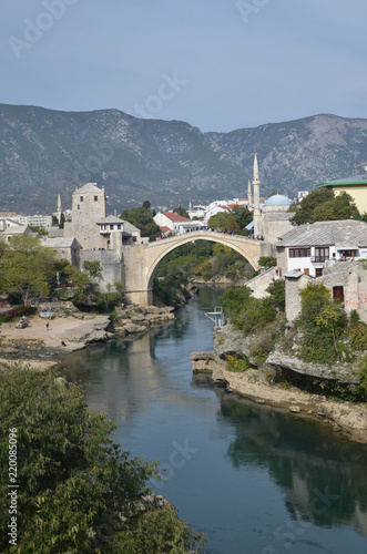 Stari Most (literally, "Old Bridge") is a rebuilt 16th-century Ottoman bridge in the city of Mostar in Bosnia and Herzegovina that crosses the river Neretva and connects the two parts of the city. 