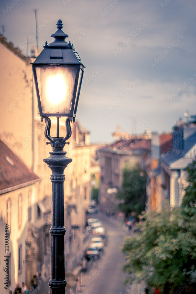 lamp post with steet blured background