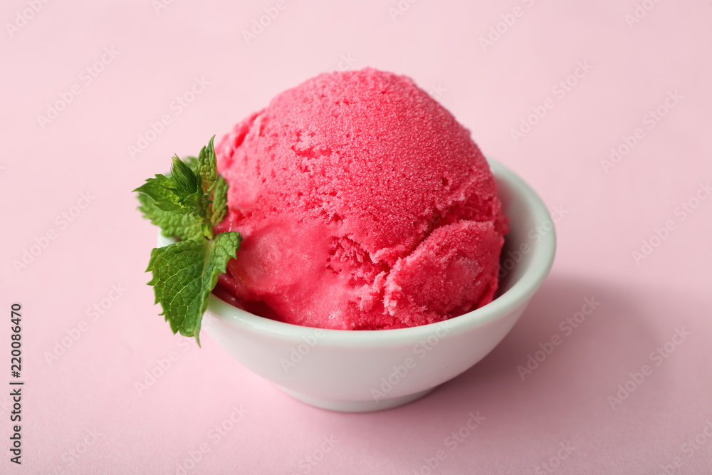 Bowl with delicious strawberry ice-cream on color background Bowl with delicious strawberry ice-cream on color background