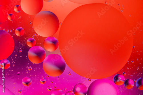 Space or planets universe cosmic abstract background. Abstract molecule atom sctructure. Water bubbles. Macro shot of air or molecule. Red and purple abstract background.