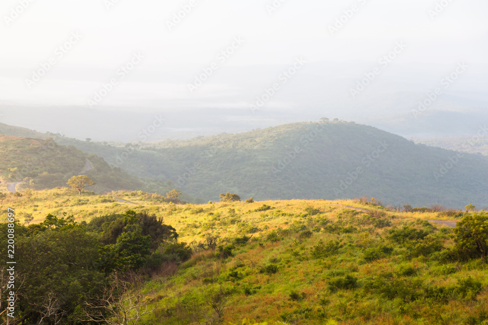 The hilly terrain and bush in the Hluhluwe-imfolozi park, KZN, South Africa.