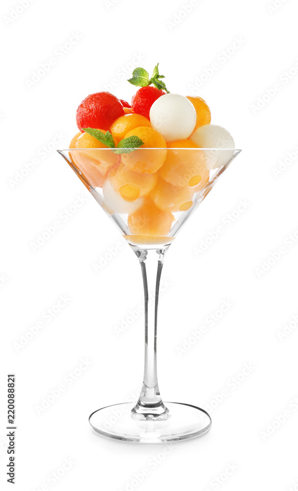 Glass with tasty melon balls on white background Glass with tasty melon balls on white background