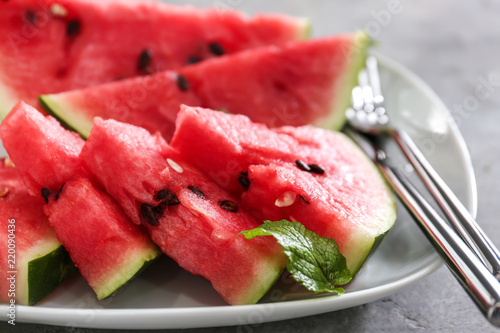 Slices of ripe watermelon on plate, closeup