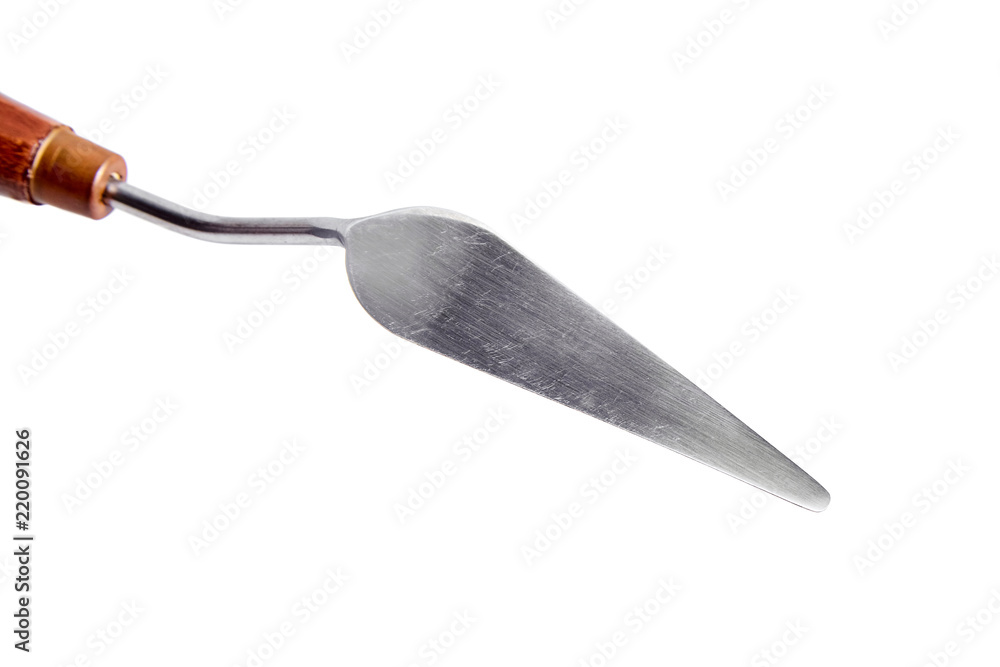 Fototapeta premium Inverted palette knife. Tool for applying paint to the canvas, isolated on white background