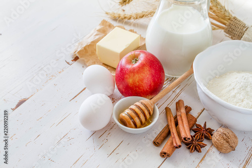 Ingredients for baking - milk, butter, eggs, flour, wheat
