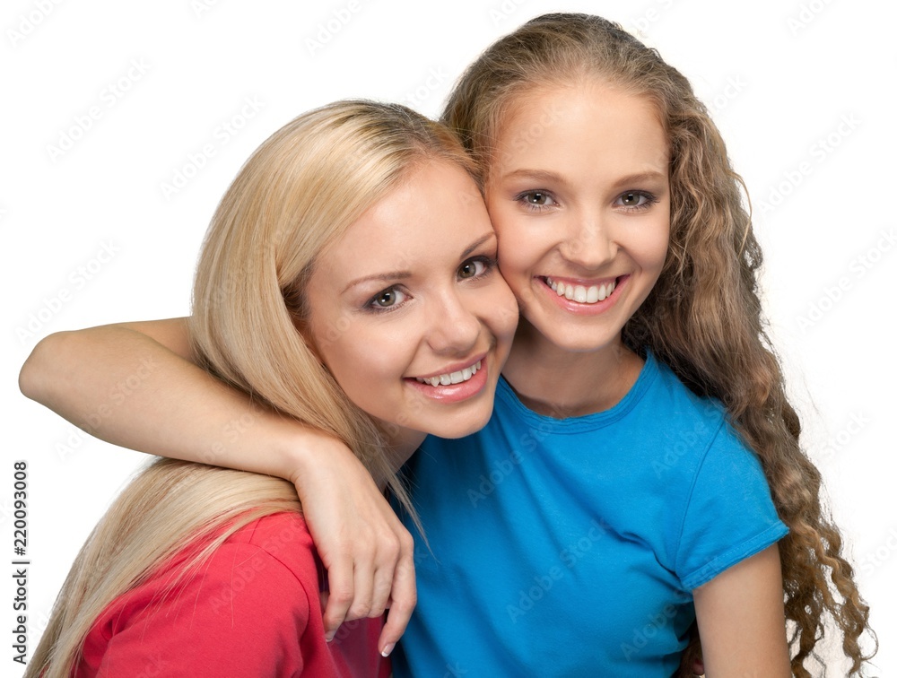 Portrait of Two Girlfriends / Sisters Hugging Portrait of Two Girlfriends / Sisters Hugging
