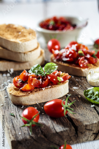 Italian bruschetta on chopping board