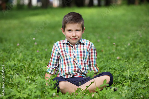 Cute little boy in park on ...