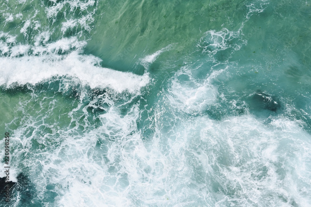 Birds eye view of crashing waves