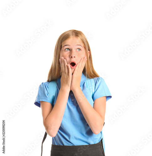 Shocked schoolgirl with bac...