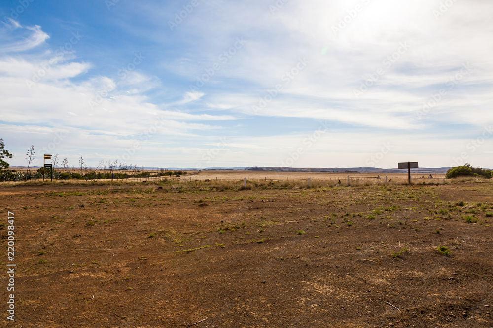 Dirt roads and fields of the Karoo near Gariep dam, South Africa.