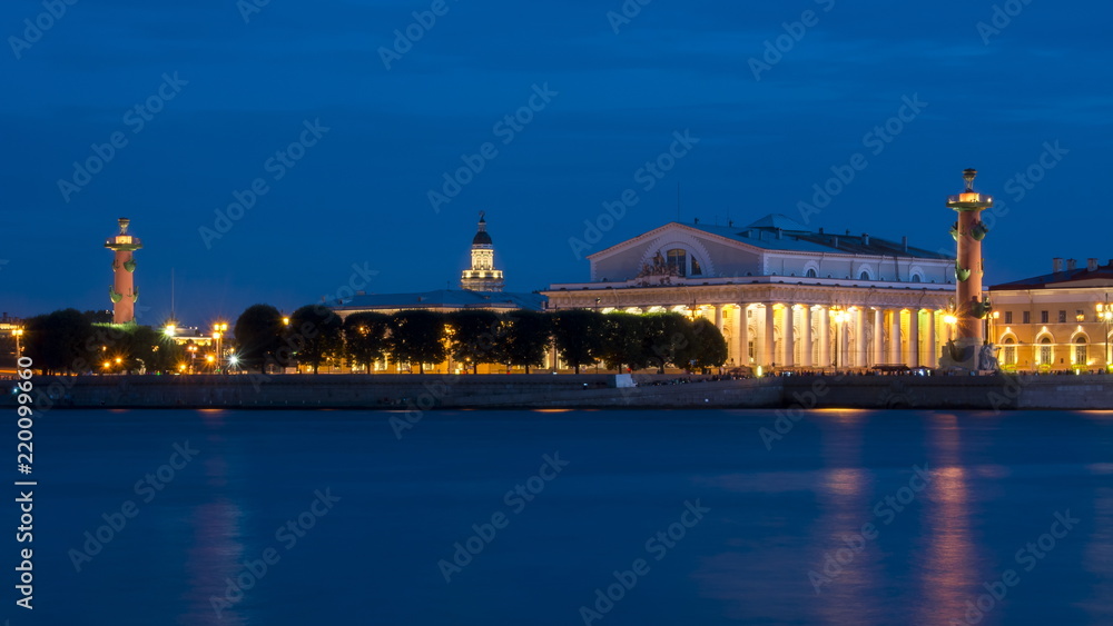Old Stock Exchange building and Rostral columns on Vasilyevsky island at night, Saint Petersburg, Russia