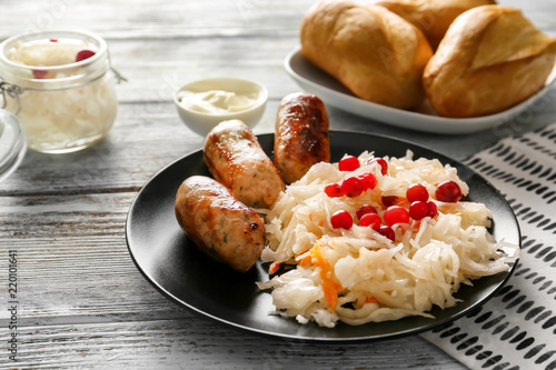 Grilled sausages with sauer...