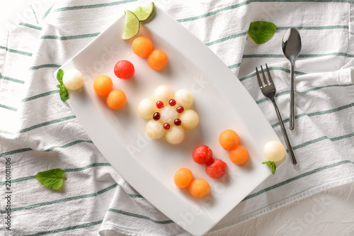 Wallpaper Mural Plate with tasty melon balls on table Torontodigital.ca