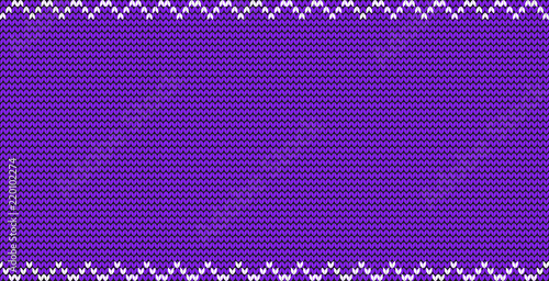 Purple or violet knitted fabric background with zig zag border frame and empty copy space for text.