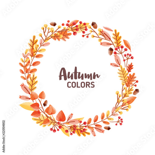 Elegant round frame, garland, wreath or border made of colorful fallen oak leaves, acorns and berries and Autumn Colors inscription inside