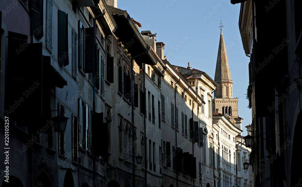 The bell tower of the Cathedral of San Marco dominates the main street of the city of Pordenone. Italy