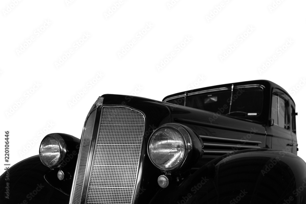Vintage, black, shiny car on white background.