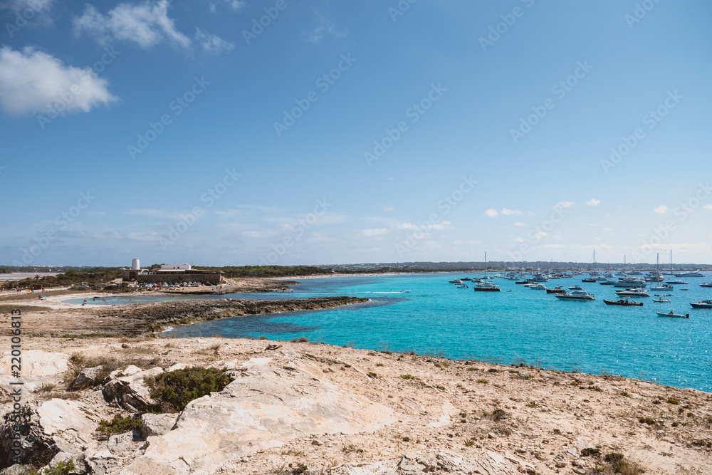 Formentera, Spain - August 12, 2018: boats on the beach of Illetas