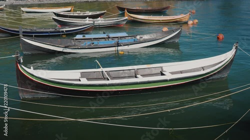 Wallpaper Mural Several small wooden boats moored at the shore of a fishing village Torontodigital.ca