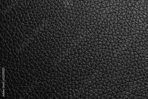 black paper texture or background with spotlight, dark tone 
