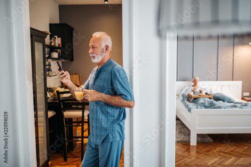 Man using a phone at home