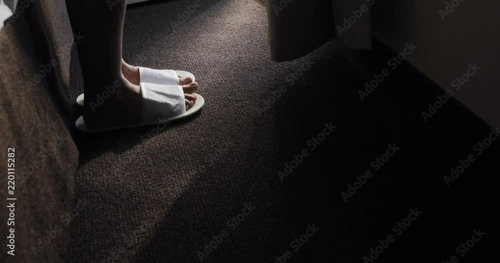 Morning, beautiful female feet get down on tiptoes from bed. Feminine barefoot lady awake early in comfortable bedroom at home, walking delicately