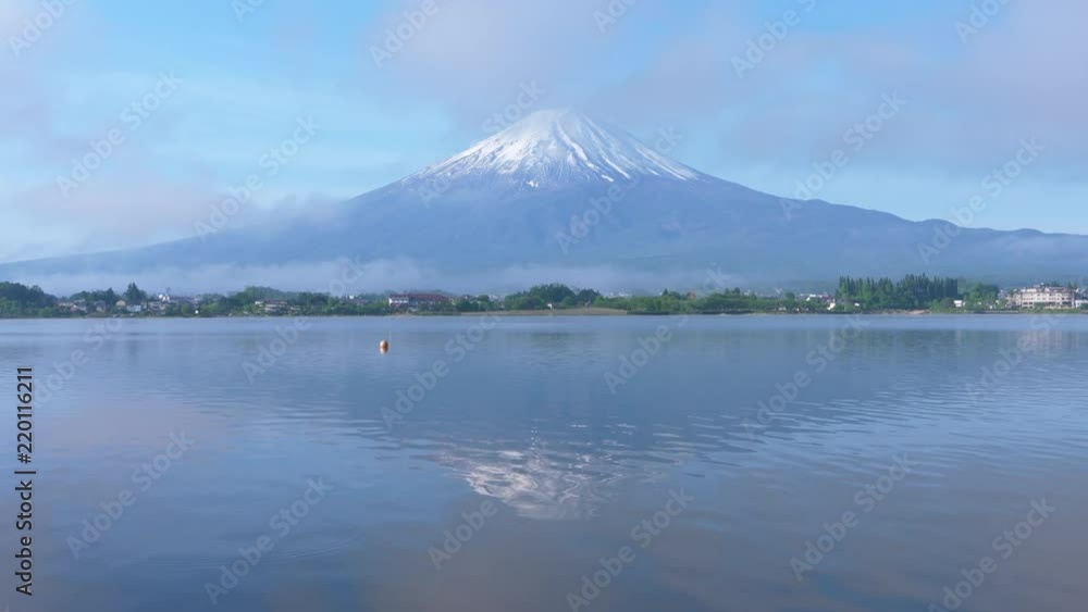Mt. Fuji over Lake Kawaguchi in the Foggy Morning Mt. Fuji over Lake Kawaguchi in the Foggy Morning