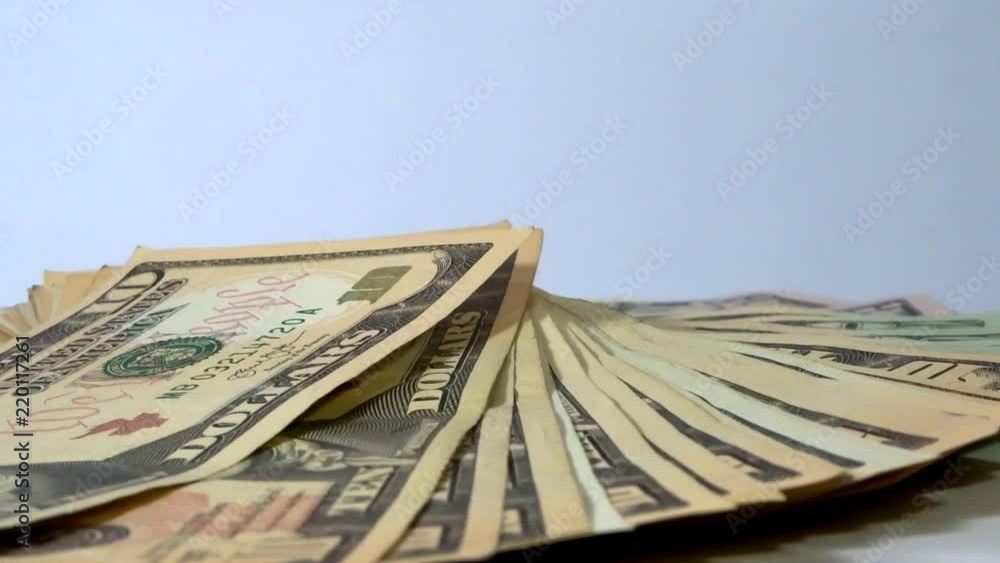 Fan of 10 dollar bills in motion