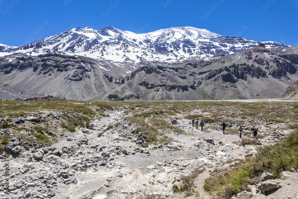 Trekking inside Andes valleys, central Chile at Cajon del Maipo, Santiago de Chile, amazing views over mountains and glaciers with awesome hikings