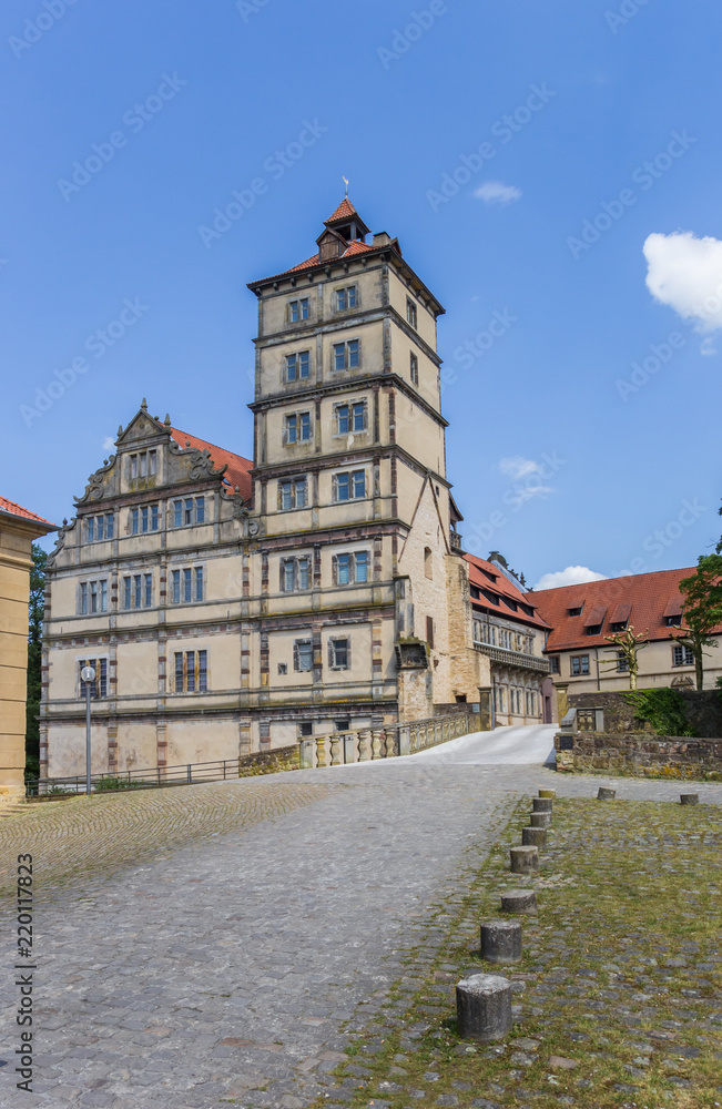 Cobblestoned street leading to the Brake castle in Lemgo, Germany