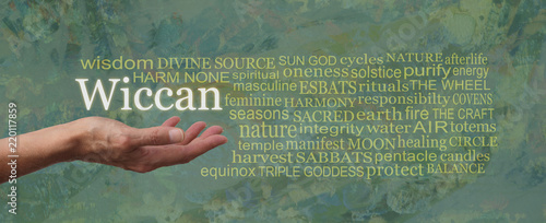 Fotografie The Wiccan Way Word Tag Cloud - female open palm hand with the word WICCAN float
